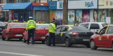 Razie printre taxiuri